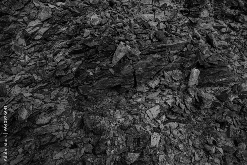 Black rock. Abstract dark weathered stone background. Black rock. Abstract dark weathered stone background.