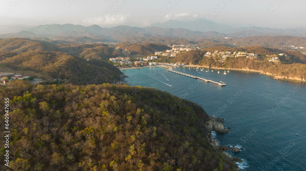 Coastal landscapes in Huatulco, mountains and sand. Oaxaca, Mexico