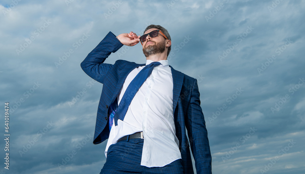 adult boss in business suit. photo of boss in suit. boss in suit on sky background. adult boss in business suit. photo of boss in suit. boss in suit on sky background.