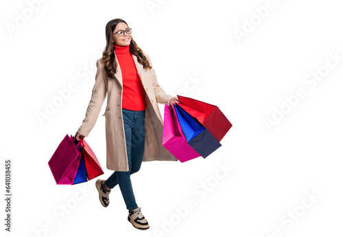 best sale offer. teen fashion girl after shopping. shopaholic. autumn shopping sale. stylish teen girl go shopping in autumn coat. shopping sale and discount. girl shopper with bags. black friday