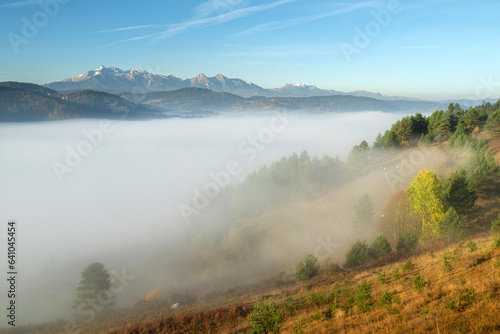Fototapeta Naklejka Na Ścianę i Meble -  Beautiful foggy morning over the Tatry mountains