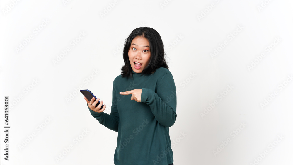 Holding Smartphone with Shocked Face and Pointing Smartphone Of Beautiful Asian Woman Isolated On White Background Holding Smartphone with Shocked Face and Pointing Smartphone Of Beautiful Asian Woman Isolated On White Background