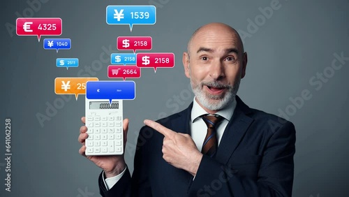 Middle aged man showing a culculator and financial technology concept. photo