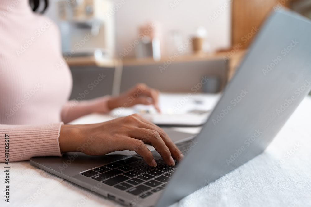 Fototapeta premium Asian business woman Calculate income with calculator, check document, financial report or profit. Income tax. Management concept. Accounting and Finance.