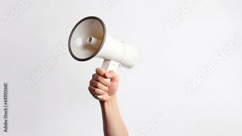 Hand of young man holding megaphone over isolated white background. Generative Ai