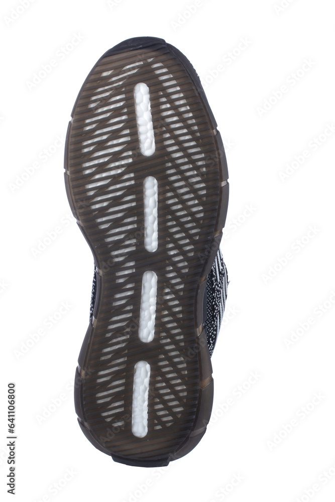 Black sole sneaker with gray touches on a white background. Black sole sneaker with gray touches on a white background.