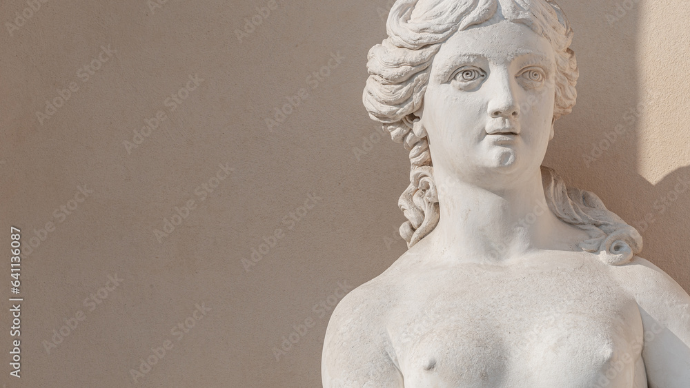 Potsdam, Germany - Old statue of a sensual Renaissance era woman after bathing in the city park and gardens of Potsdam, details, closeup, with copy space background