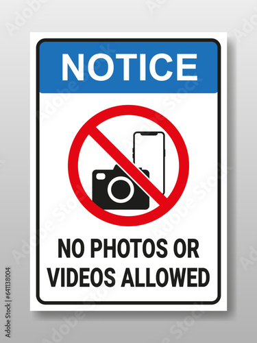 Notice no photo or videos allowed sign with camera or smartphone. Photography or video is prohibited. taking photos or videos is illegal. Design for sticker or metal board sign.