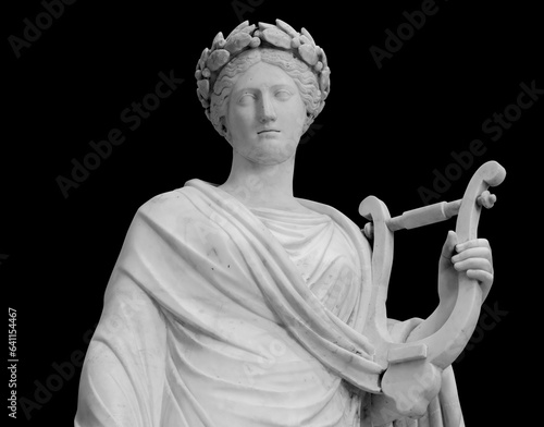 Ancient sculpture of muse. Statue woman with lyre isolated photo with clipping path photo