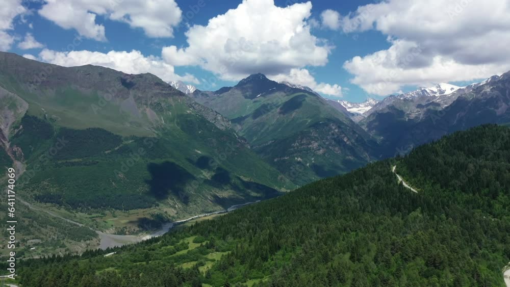 Flight on drone above mountains in Mestia, Svaneti, Georgia. Aerial view of summer mountain landscape. Flight on drone above mountains in Mestia, Svaneti, Georgia. Aerial view of summer mountain landscape.