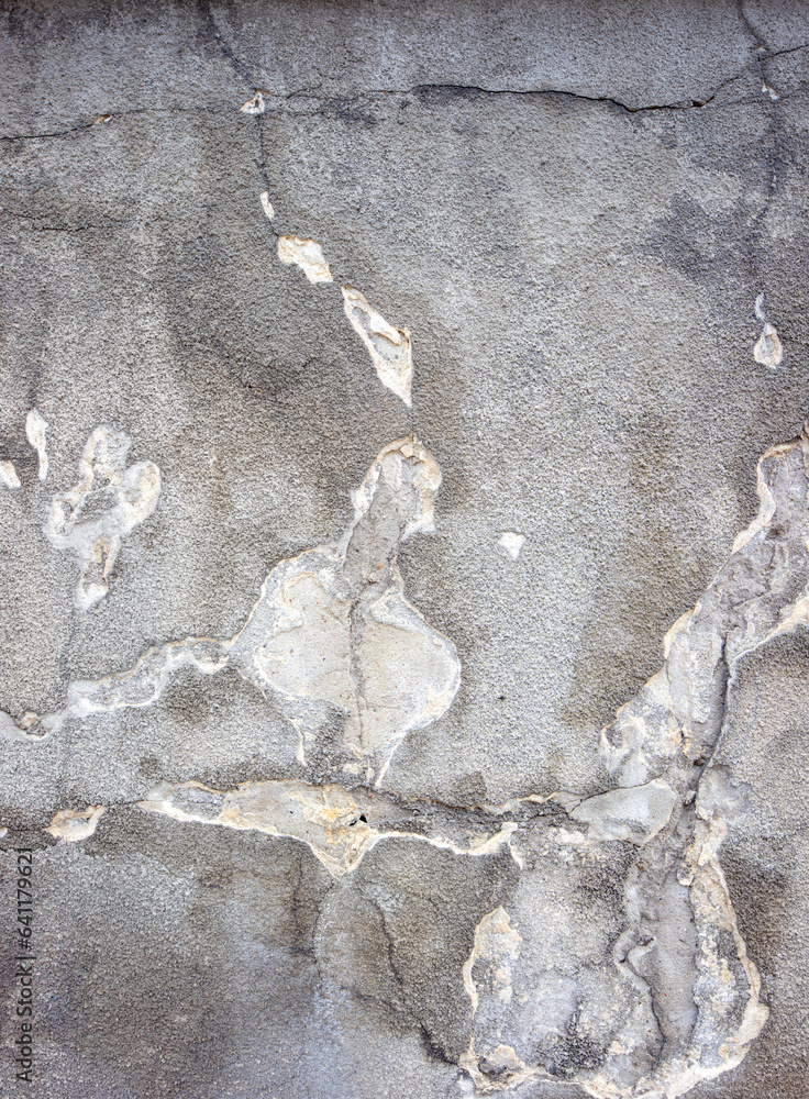 Obraz premium Tekstura. Zniszczony szary tynk na ścianie.