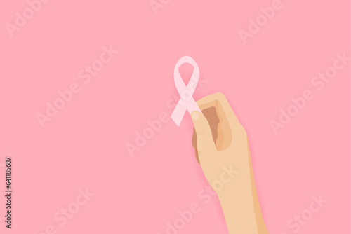 The concept of breast cancer awareness and prevention. The hand holds a pink ribbon symbol to support and fight cancer health. Vector illustration