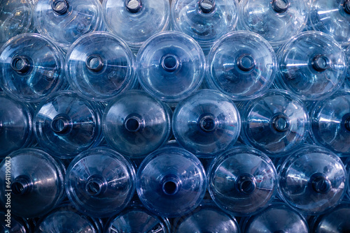 Obraz na plátně Plastic bottle or tank for drinking water in production line of factory