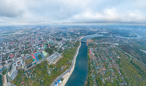 Fototapeta Naklejka Na Ścianę i Meble -  Ufa, Russia. Panorama of the city from the air during sunset. Cloudy weather. Aerial view
