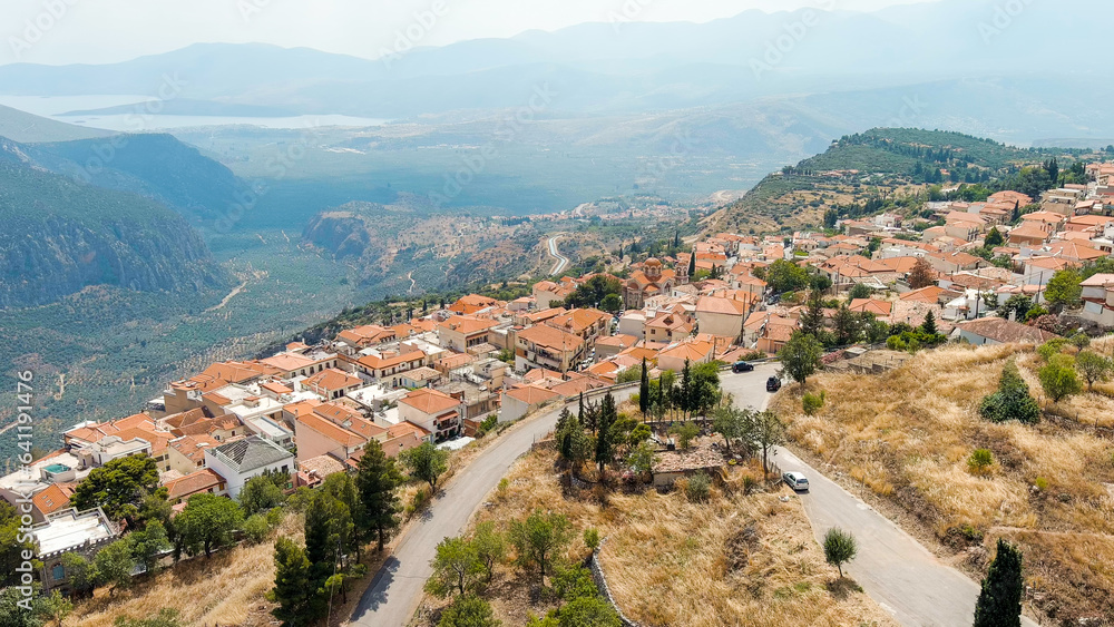 Delphi, Greece. Modern tourist city. Sunny weather, Summer, Aerial View