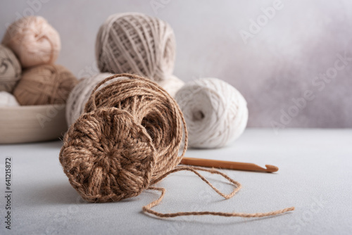 Spiral round jute napkin and wooden crochet hook