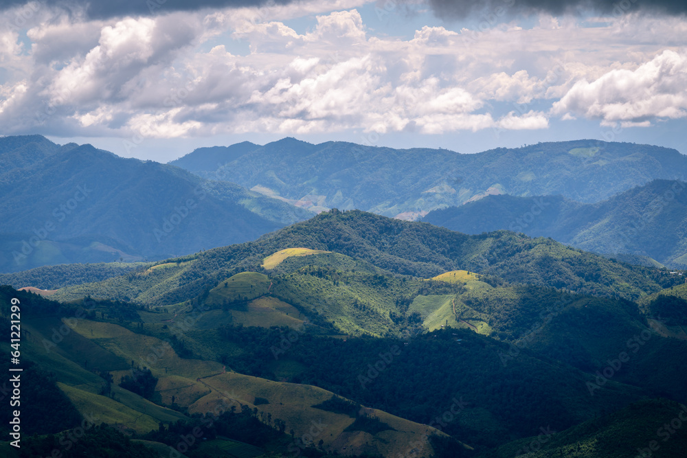 Beautiful mountain range view point with cumulonimbus cloud and storm in northern of Thailand (Tak province, Thailand)