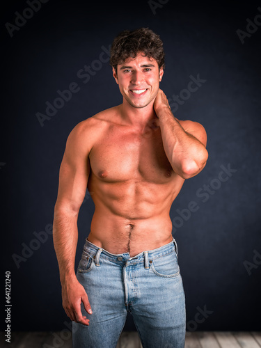 Photo of a shirtless man posing for a picture