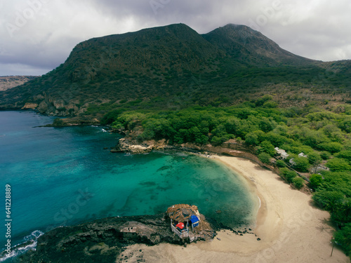 Aerial drone Tarrafal in Santiago Island, Cabo Verde showcase golden beaches, azure waters, and rugged mountains, it's a paradise for nature lovers. The charming town, historic sites photo