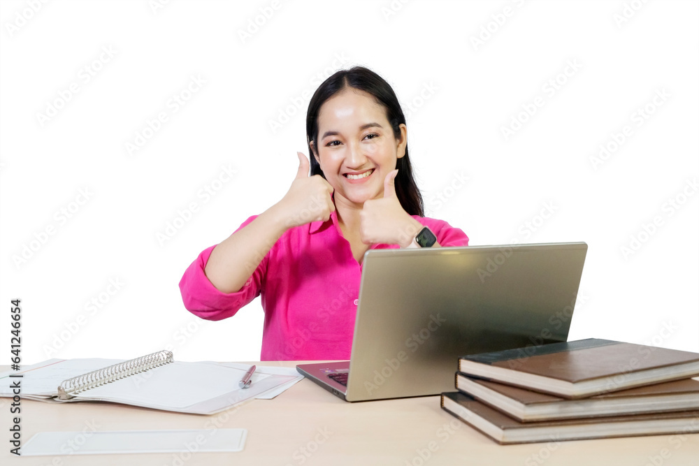 Photo of female college student showing thumbs up Photo of female college student showing thumbs up
