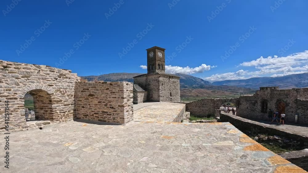 Panoramic view of the clock tower of the Ottoman castle fortress of Gjirokaster or Gjirokastra. Albania. Kulla e Sahatit Panoramic view of the clock tower of the Ottoman castle fortress of Gjirokaster or Gjirokastra. Albania. Kulla e Sahatit
