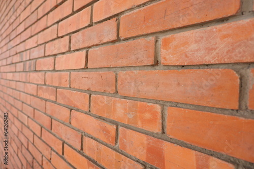 Close-up of an antique brick wall in a building