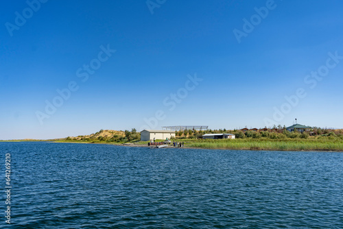 blue water body in a lake with a small waves in © oybekostanov