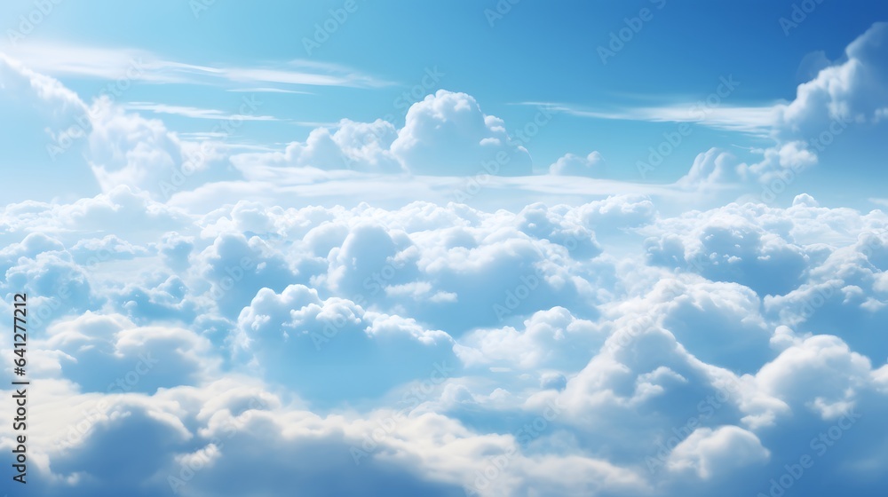 Photo of a clear blue sky with fluffy white clouds Photo of a clear blue sky with fluffy white clouds