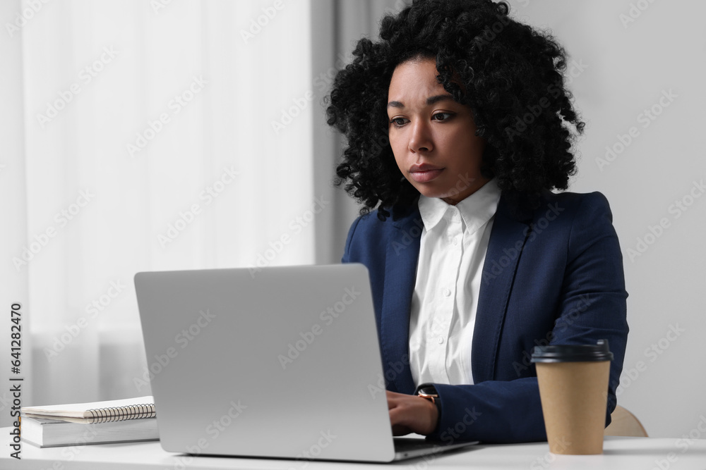 Deadline concept. Businesswoman working with laptop in office. Space for text Deadline concept. Businesswoman working with laptop in office. Space for text