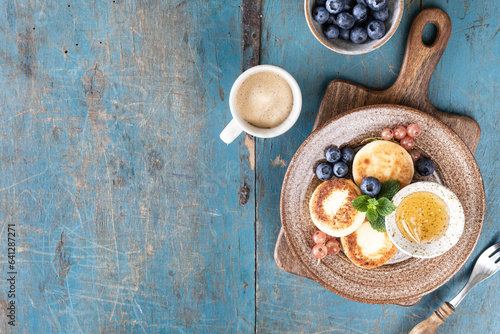 Wallpaper Mural Cottage cheese pancakes, cheesecakes, ricotta fritters with fresh blueberries, currants and peaches Torontodigital.ca