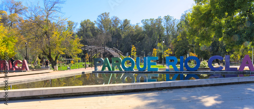 "Parque" sign at the Entrance of the "Rio claro" (="claro river") park downtown Talca.