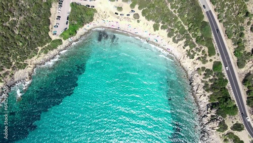 4k Top view of the beach with white sand and perfectly clear water. Luxury beach on Sardinia island in Italy