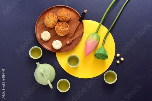 Background of Chinese Traditional Festival Mid-Autumn Festival.The Chinese meaning on the mooncake in the picture is: high-quality five kernels, milk flavored grapes, chestnuts, three flavors.