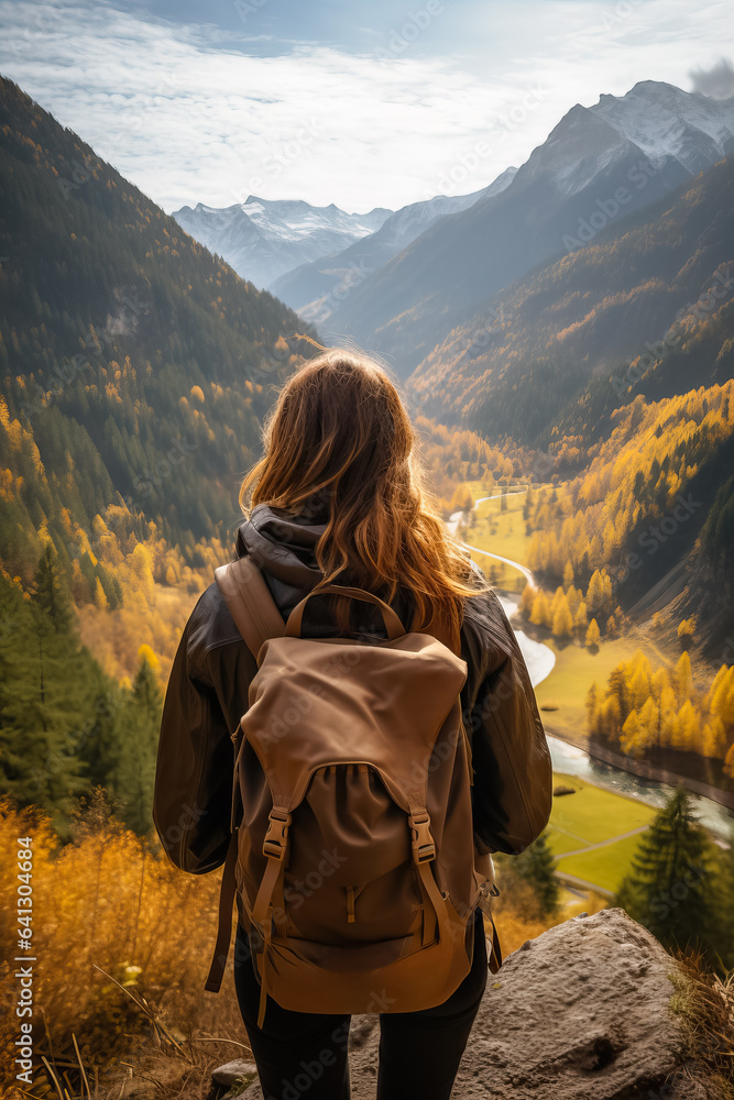 Exploring nature and feeling free while hiking through a stunning mountain landscape with a backpack Exploring nature and feeling free while hiking through a stunning mountain landscape with a backpack