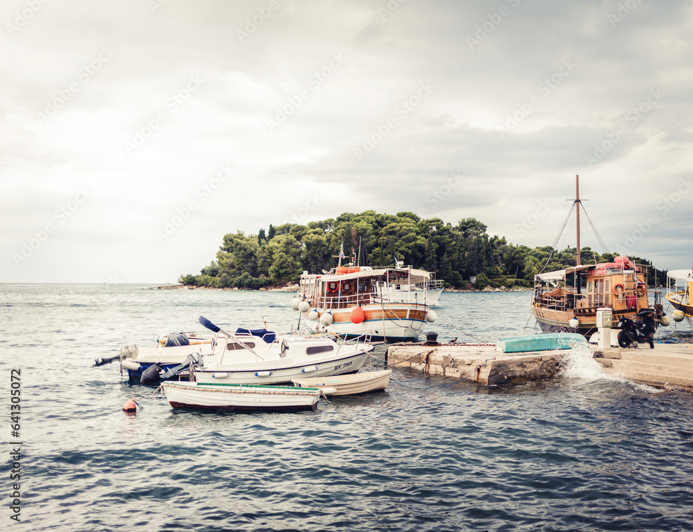 Rovinj, Croatia. Motorboats and boats on water in port of Rovinj.