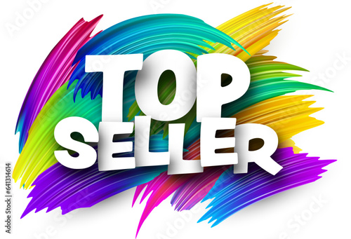 Top seller paper word sign with colorful spectrum paint brush strokes over white.