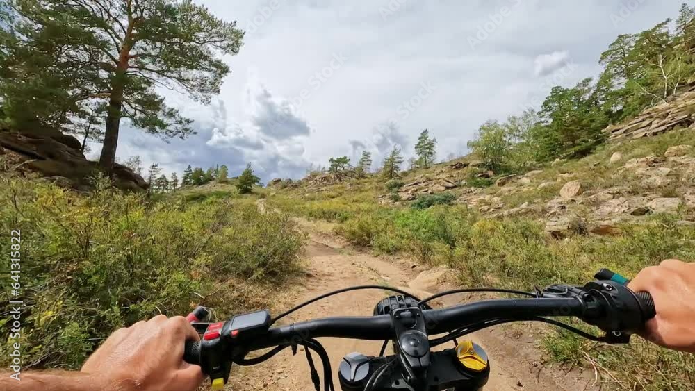 POV Electric Bike Riding Up and then Down on a Mountain Hill with Sticking Stones. 60 fps, H.264, 8bit, chroma subsamlping 4:4:4 POV Electric Bike Riding Up and then Down on a Mountain Hill with Sticking Stones. 60 fps, H.264, 8bit, chroma subsamlping 4:4:4