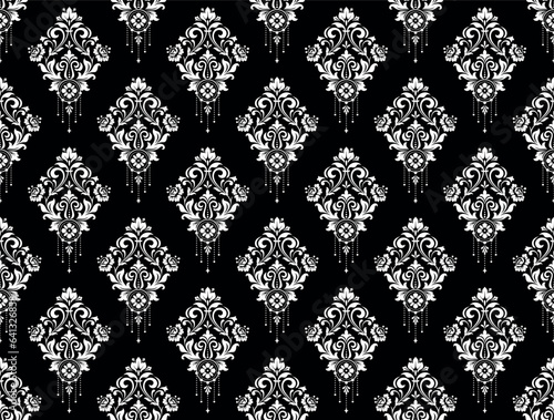 Wallpaper in the style of Baroque. Seamless vector background. White and black floral ornament. Graphic pattern for fabric, wallpaper, packaging. Ornate Damask flower ornament