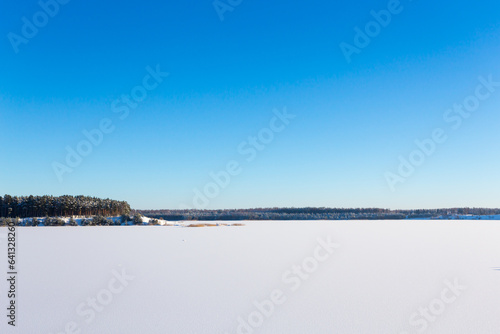 Frozen lake with ice and snow