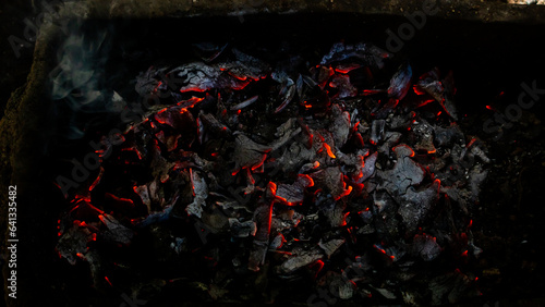 burning coconut shell coals as background