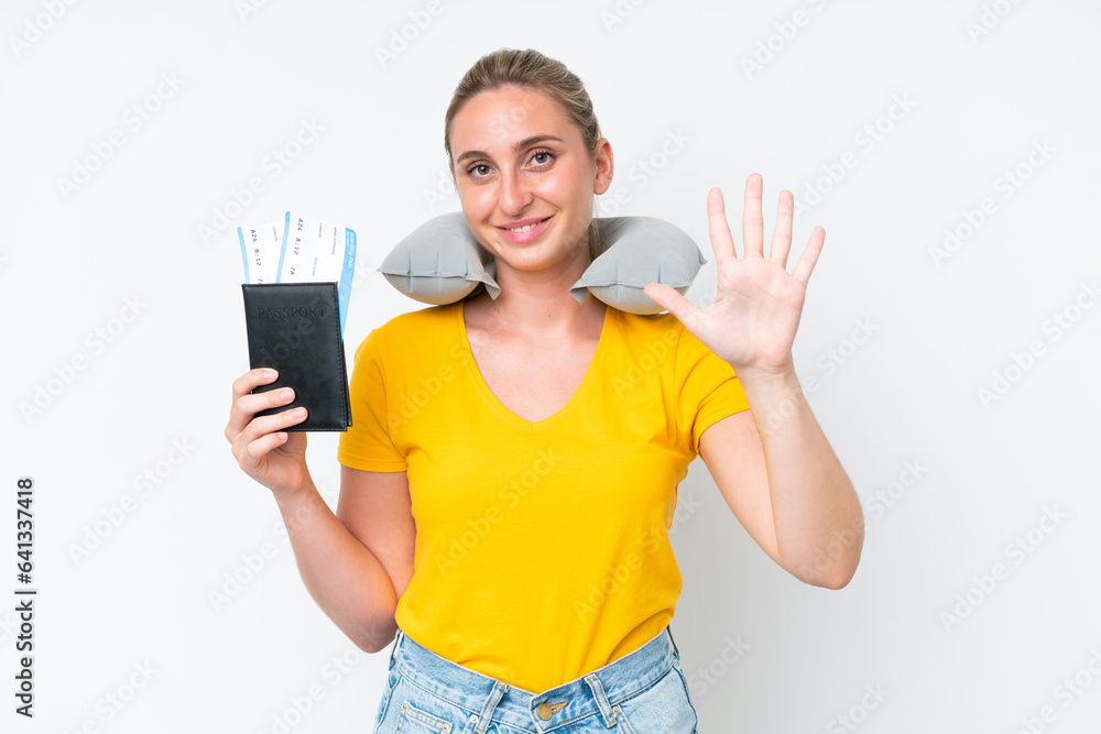 Woman with Inflatable Travel Pillow counting five with fingers Woman with Inflatable Travel Pillow counting five with fingers