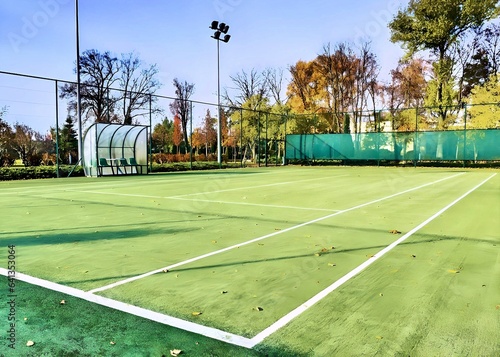 Tennis court in the autumn park.