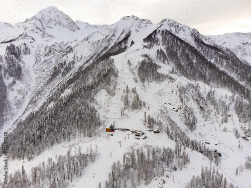 A view of the Red Valley ski resort and the snowy mountain landscapes of Krasnaya Polyana in Sochi. High quality photo