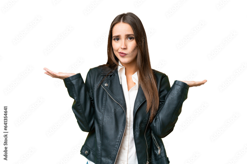 Young beautiful woman over isolated chroma key background having doubts while raising hands Young beautiful woman over isolated chroma key background having doubts while raising hands