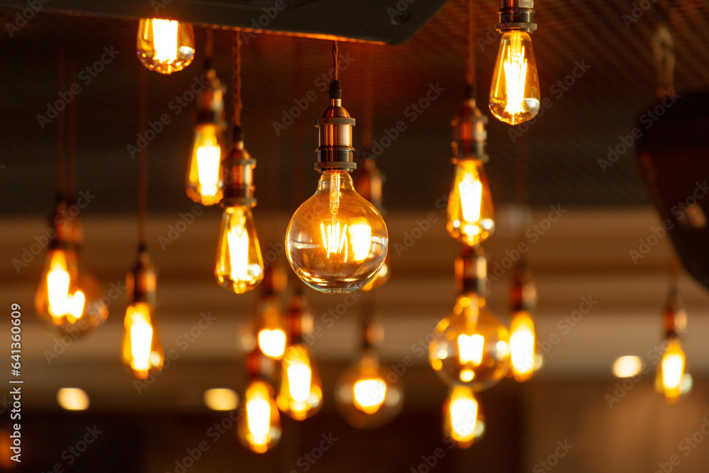 Decorative antique edison style filament light bulbs hanging from ceiling