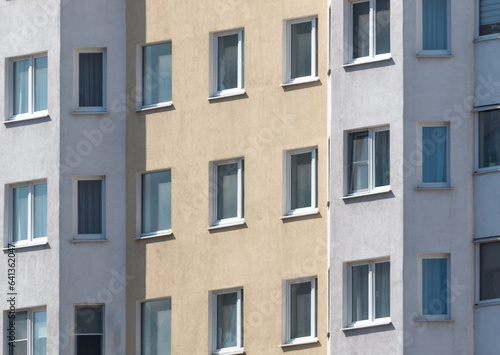 Windows and walls in a multi-storey building. Background
