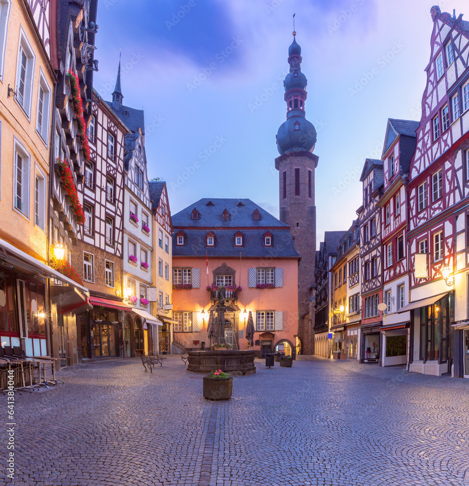 Facades of old traditional houses in the market square at dawn. Cochem. Germany.