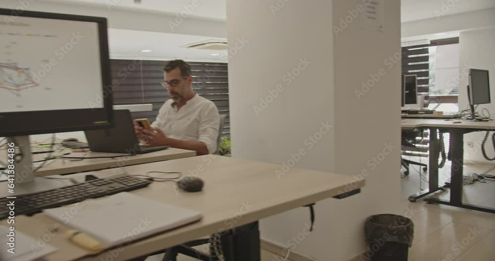 Camera panning movement of office workers while working together. Other coworkers are resting during working hours, diverse ethnicity in the office Camera panning movement of office workers while working together. Other coworkers are resting during working hours, diverse ethnicity in the office