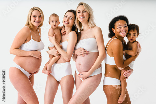 Beautiful pregnant women and mothers with babies, motherhood and pregnancy concept