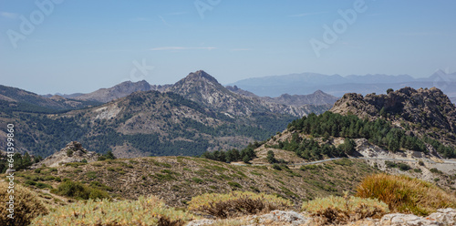Mountain views from Sierra Nevada, Spain -  including glimpses of meandering trails and roads, inviting exploration of the pristine wilderness